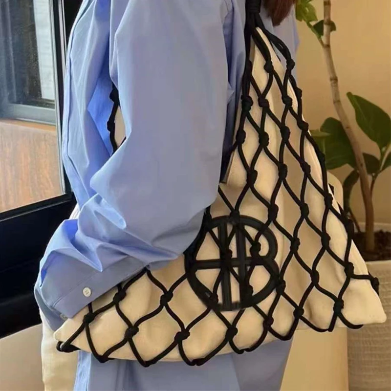 Hollow Out Bucket Mesh Bolsas tejidas hechas a mano para mujeres Bolsos y monederos de diseñador de lujo 2024 Nuevo en vacaciones casuales Hombro de playa Envío gratis Llegada rápida