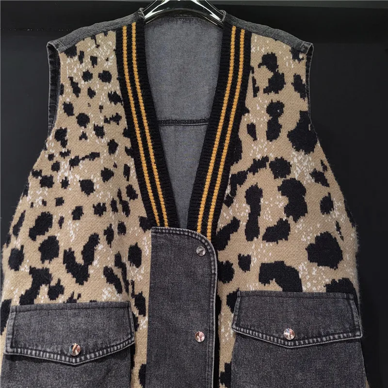 

Edgy printed knit vest with leopard denim patchwork. Oversized, sleeveless & a bold streetwear statement.
