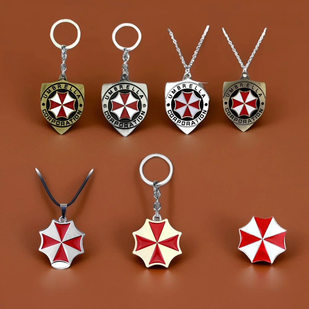 Spiel Resident Evil Roter Regenschirm Schlüsselanhänger Halskette Vintage Sechsflügeliger Ungeborener Schlüsselform Schlüsselanhänger Schlüsselanhänger oder Brosche für Männer Fan