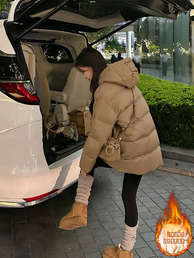 

Пуховик женский утепленный свободного кроя, зимний, с капюшоном, на молнии, удлиненный, средней длины