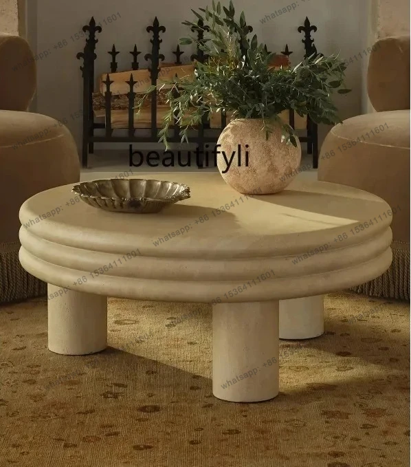 

Medieval cave stone coffee table living room French small round table light luxury high-end minimalist cream