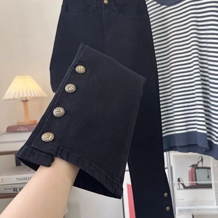 

Irregular breasted pants female autumn new large size loose elastic high waist slim fashion design sense niche jeans.