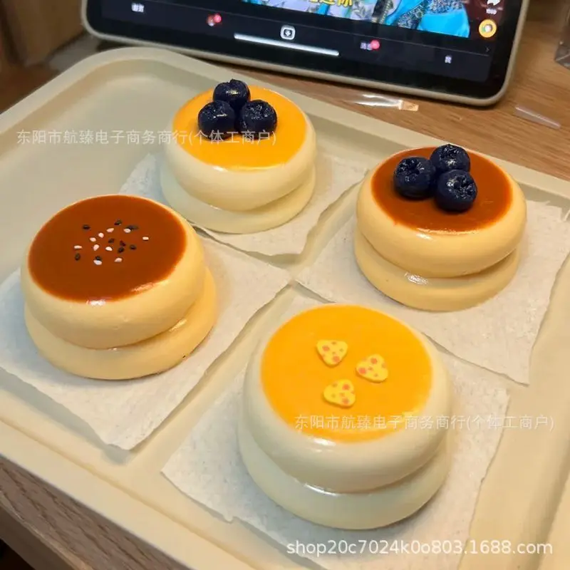 Simulated fluffy cake-shaped toys, squeezing toys, stress-relieving toys, soft fingertip toys, blueberry and strawberry toys wit