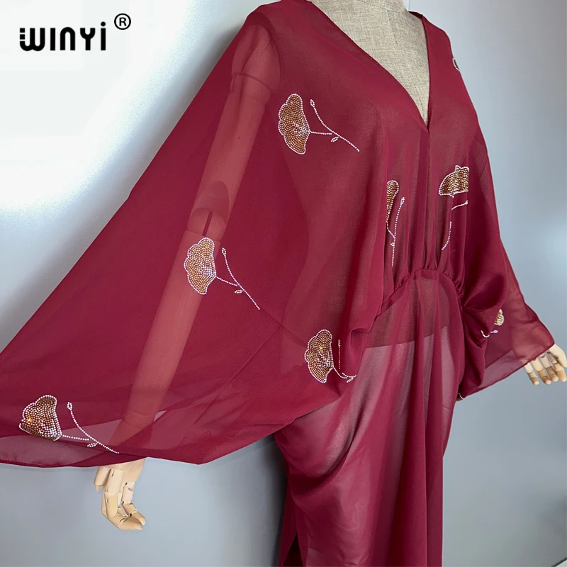 WINYI-vestido sexy con cuello en V, perspectiva de diamantes de imitación, Abaya musulmana para mujer, ropa de playa, caftán de moda, abaya de lujo de Dubái
