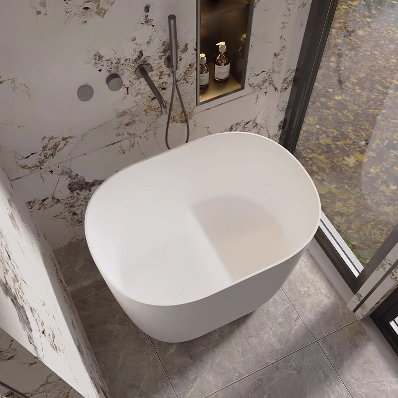 Qimei Stone Corian Polimero Pietra artificiale Schiuma profonda Mini vasca da bagno ovale seduta per uso domestico
