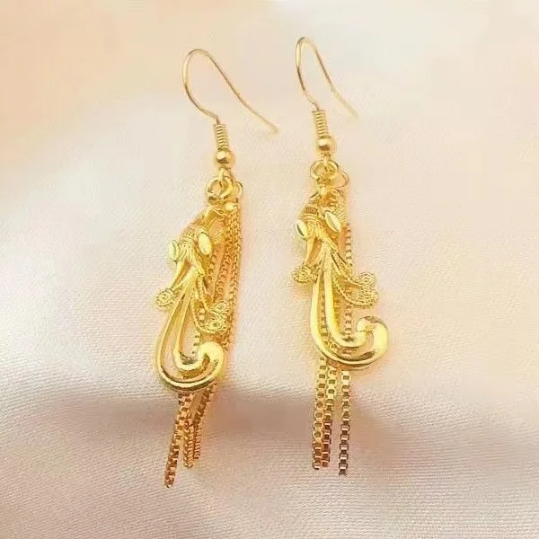 

AU999 24K Gold Peacock Tassel Earrings | Exquisitely carved golden feathers, dynamic tassels, adding exotic romance to women