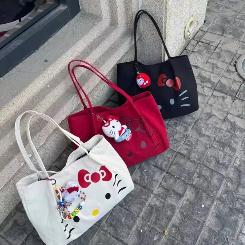 

MINISO Canvas Hellokitty Cute Shoulder Bag Large Capacity Casual Tote Bag Kawaii Cartoon Kitty Cat Handbags Versatile Bags Women