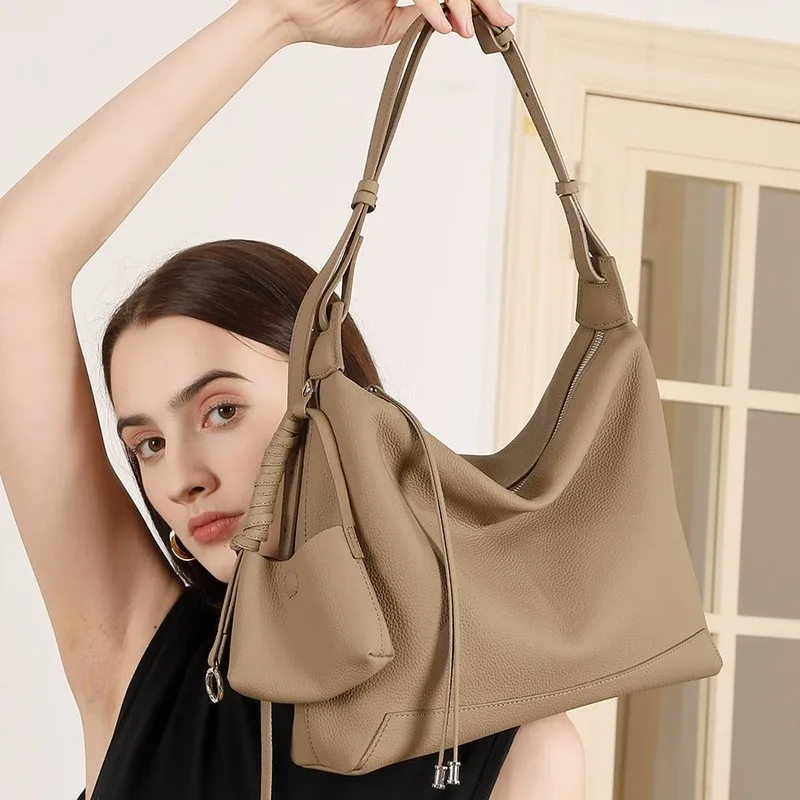 New minimalist style women's leather handbag, cowhide shoulder bag, large capacity commuting tote bag, high-end feel armpit bag