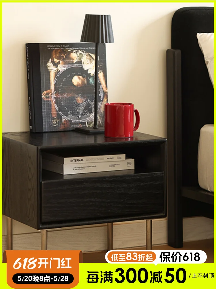 The bedroom bedside table is minimalist, modern and creative, with stainless steel legs and a black color scheme. The bedside image 3