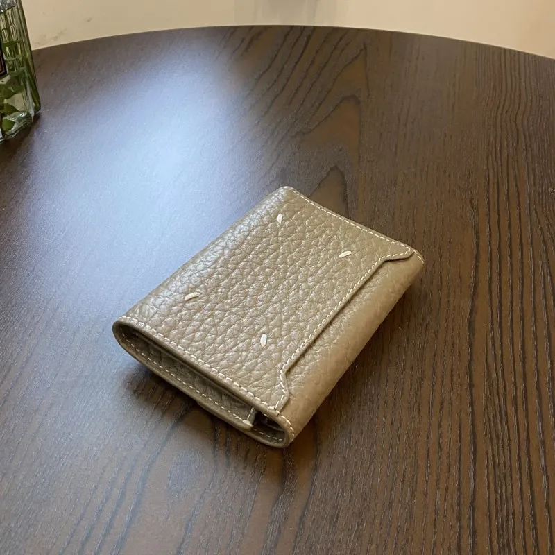 2025 Women's Cowhide Short Three-fold Wallet European American and Korean Version Folding Small Change Multi-purpose Wallet