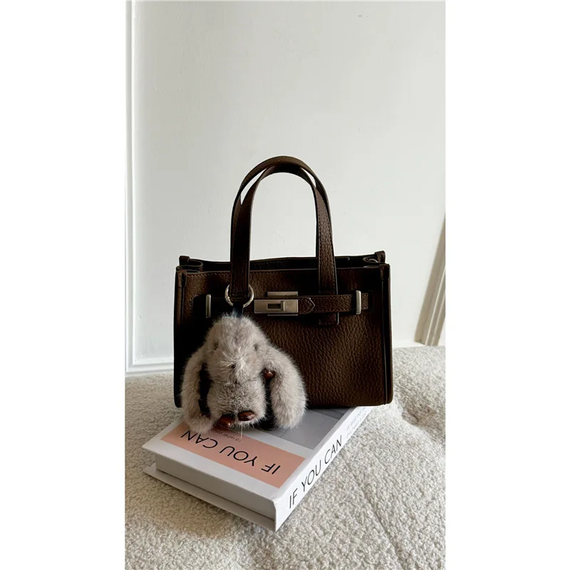 حقيبة كيلي جلدية منقوشة بالليتشي للنساء ذات إحساس عالٍ بالفخامة، حقيبة يد للتنقل، حقيبة كتف ساعي البريد، حقيبة حمل صغيرة