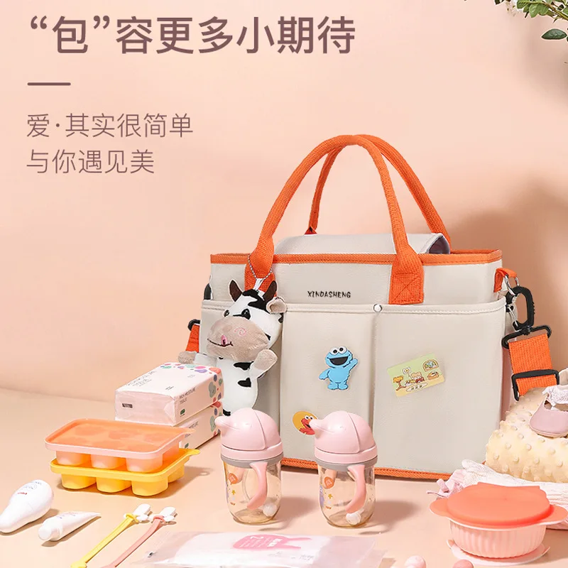 Mother and baby bag large-capacity handbag splash-proof shoulder mommy bag out walking baby portable can hang stroller