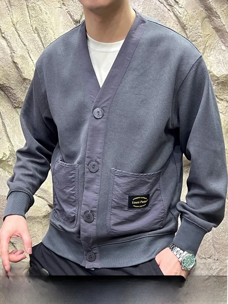 

Модный открытый кардиган большого размера с V-образным вырезом и крупными кетами, тканая ткань, свободная посадка, осенний новый шлейф для пар