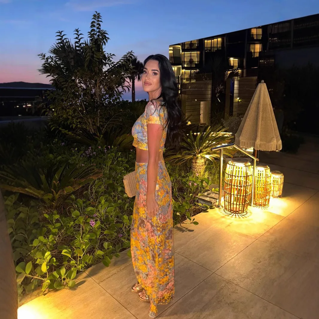 No verão de 2025, a nova moda feminina, lazer e coringa vestido de umbigo estampado terno temperamento elegante terno de duas peças