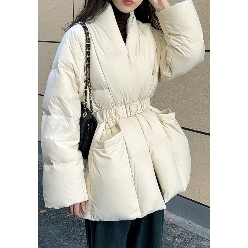 

The New Loose and Warm Cotton-padded Jacket with Retro Design Cinched Waist and Large V-neck Is Trendy Winter Fashion for Women