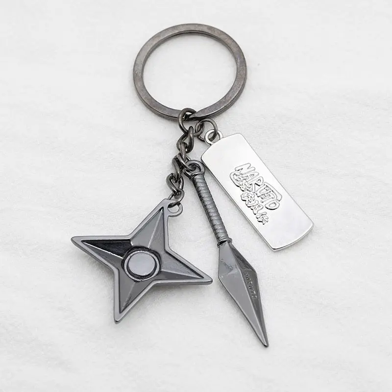 

Naruto anime peripheral Itachi Konoha rebel forehead protector shuriken kunai three-piece set alloy keychain bag pendant gift