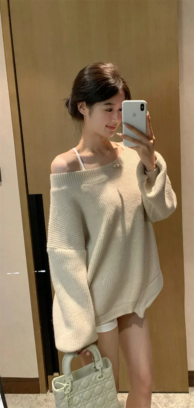 2025 Top da donna autunno nuovo stile kaki manica lunga orlo irregolare pullover in maglia allentata sexy e alla moda