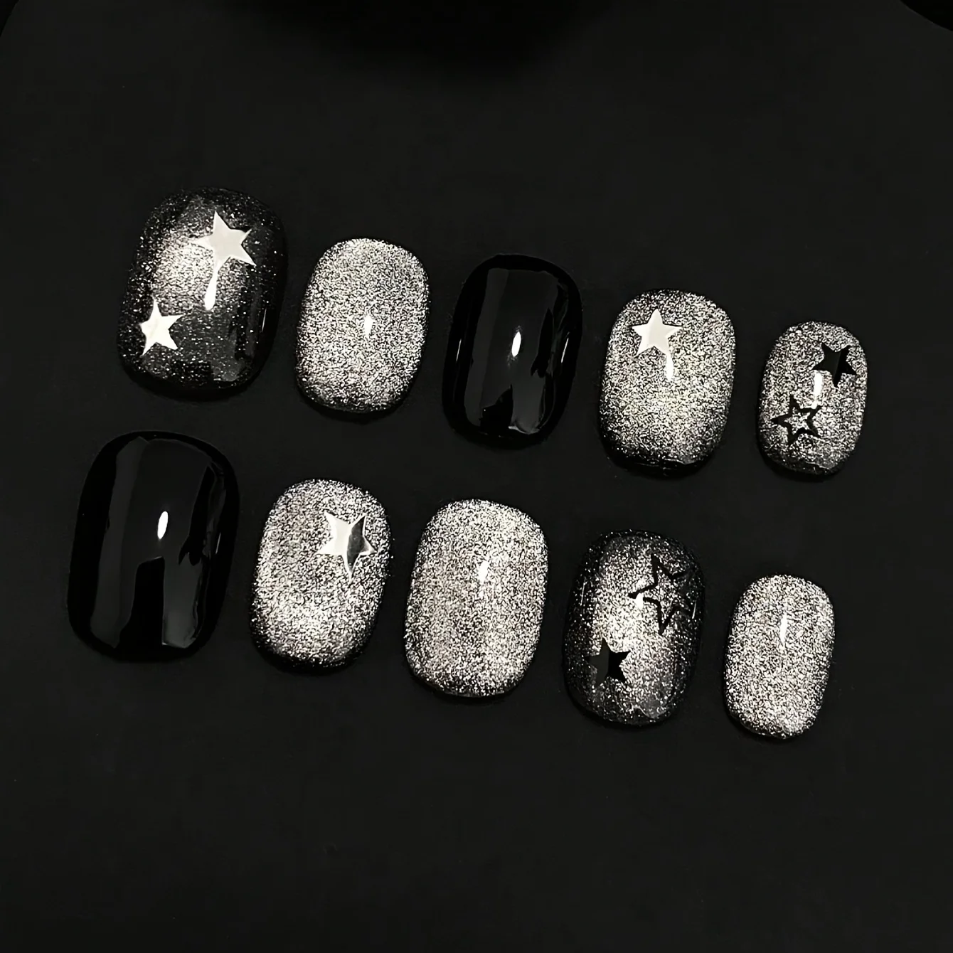 10 faux ongles pressés faits à la main en forme de haricot, magnifiques faux ongles, étoiles œil de chat argentées et noires, adaptés aux femmes