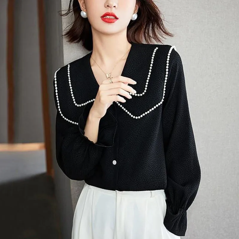 Doll Collar Black Shirt Women 2024 Spring New Long Sleeved Covering the Stomach Westernization Sweet Unique Temperament Tops