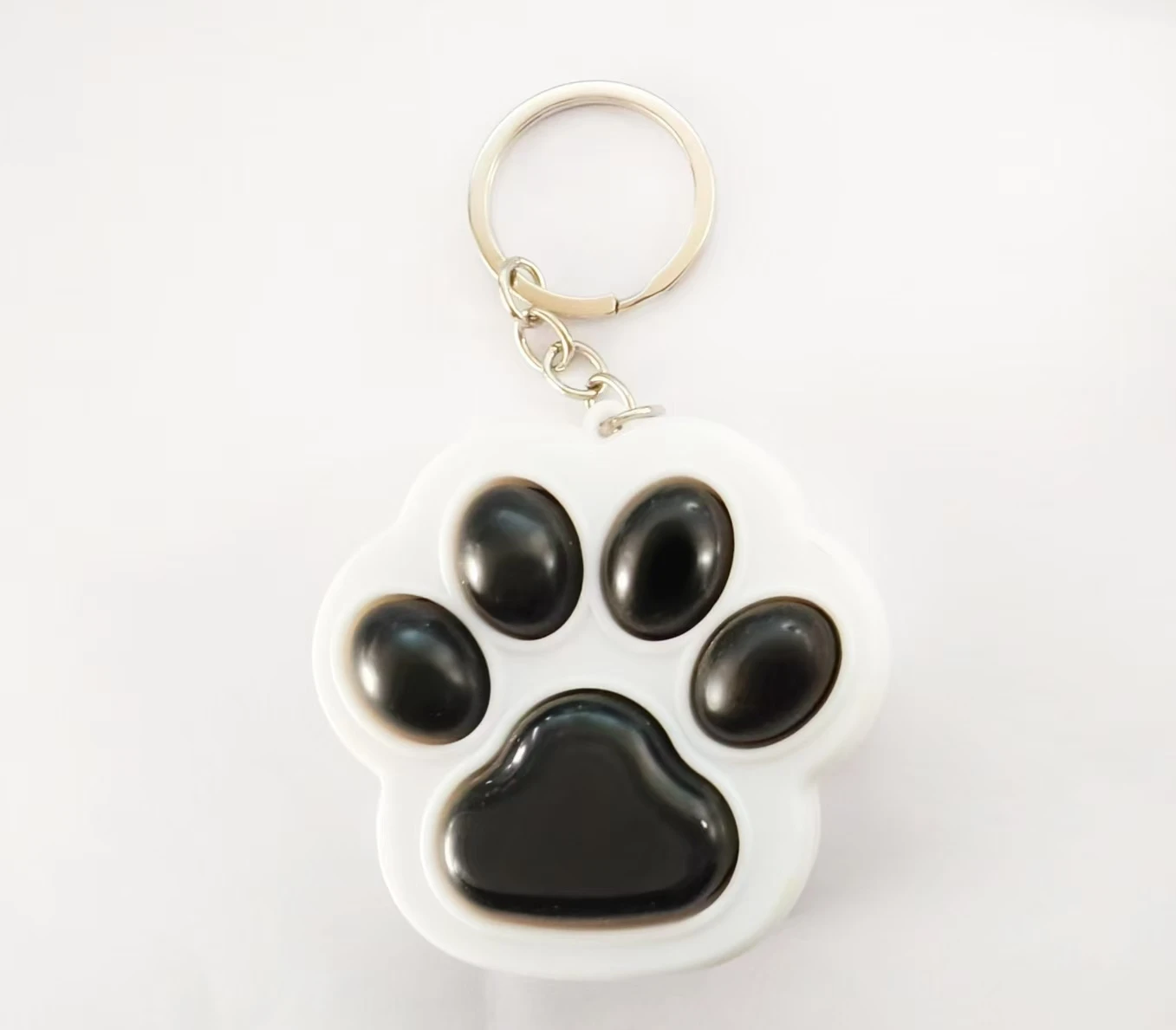 新しい創造的な人格ストレスリリーフおもちゃかわいい猫の足キーボードキーチェーンペンダントカップルバッグペンダントおもちゃギフト