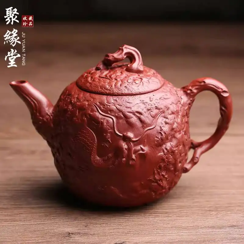 

Оригинальный чайник из исинской фиолетовой глины Yìnlong Gōngchūn, биомиметический цветочный сосуд, полностью ручная работа известных мастеров, заварочный чайник.