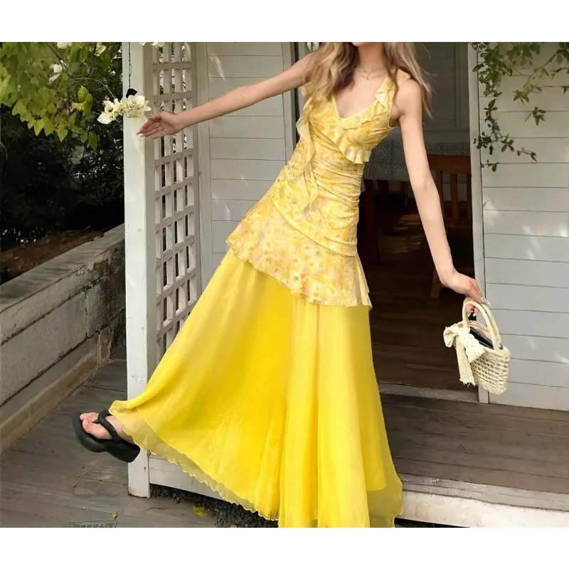 

French Sweet and Spicy Wind Yellow Floral Irregular V-neck Suspender Dress Spice Girl High Waist Stitching Gauze Skirt