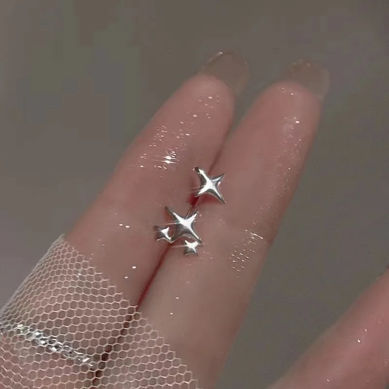 Asymmetric Silver Four Point Star Stud Earrings