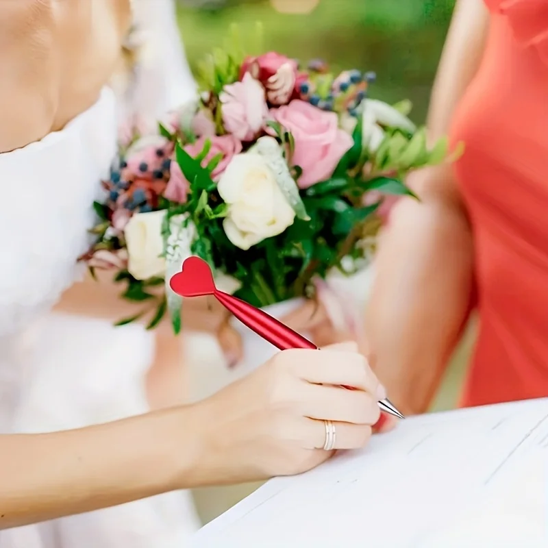 أقلام حبر جاف حمراء قابلة للسحب على شكل قلب، تصميم بيضاوي مريح، آلية ملتوية للإغلاق، مثالية للاستخدام المكتبي والمدرسة