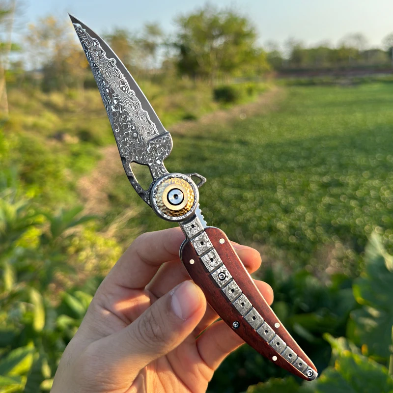 High-quality VG10 Damascus steel folding pocket knife, ideal for outdoor activities, camping, and everyday carry (EDC) knife