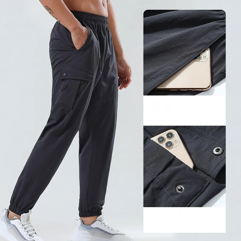 Yoga sports pants with logo men loose cuffed pants multi-pocket niners cargo pants hidden drawstring hiking trousers sweatpants