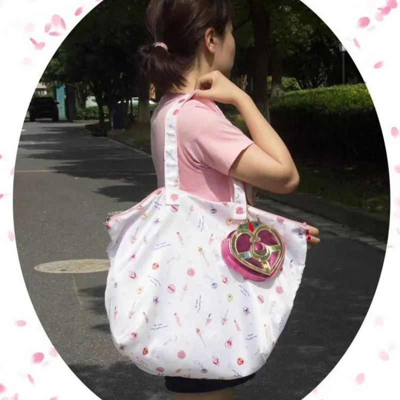 Nouveau sac fourre-tout pliable multifonction Sailor Moon, motif cœur cosmique brillant, porte-monnaie, sac de courses polyvalent, cadeau mignon