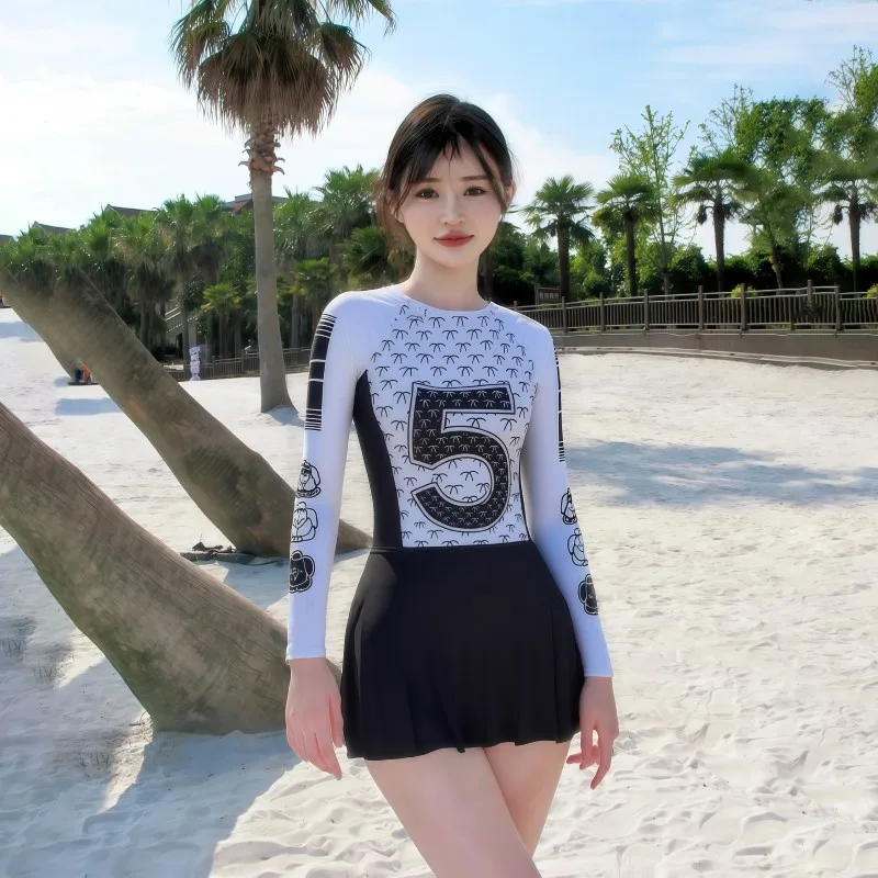 

Women's Long-sleeved One-piece Swimsuit with Mini-skirt Two-piece Set UV Protection Conservative Rash Guard Diving Surfing Suit