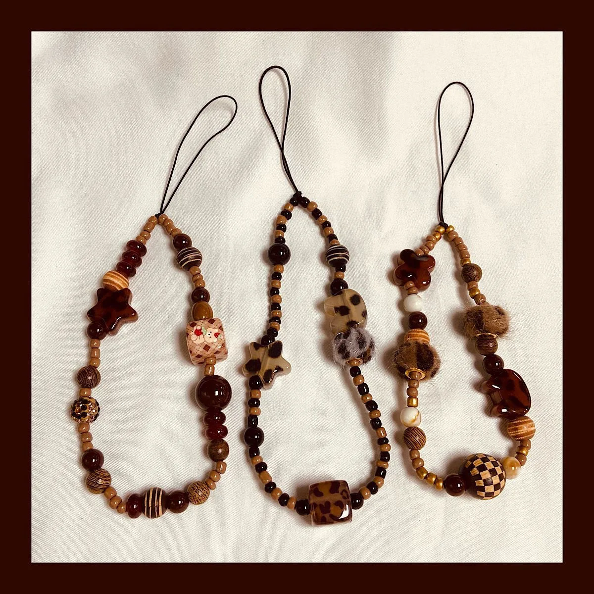 

Brown bead retro cool plush cute cat bow butterfly charms bag chain bracelet for iphone airpods phone lanyard anti loss rope