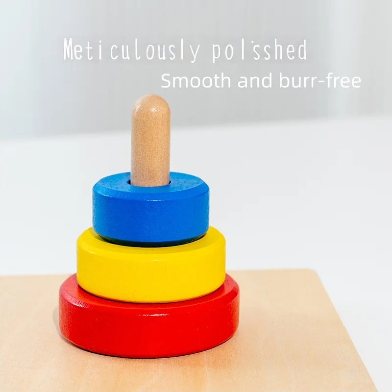 لعبة مكعبات التراص الخشبية الملونة تتميز بأشكال وألوان متنوعة، هذه الكتل تساعد الأطفال على تطوير المهارات الحركية الدقيقة مع