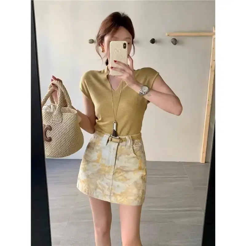 2025 nouvelle mode jaune cravate-teinture Denim jupe femmes taille haute mince jupe courte