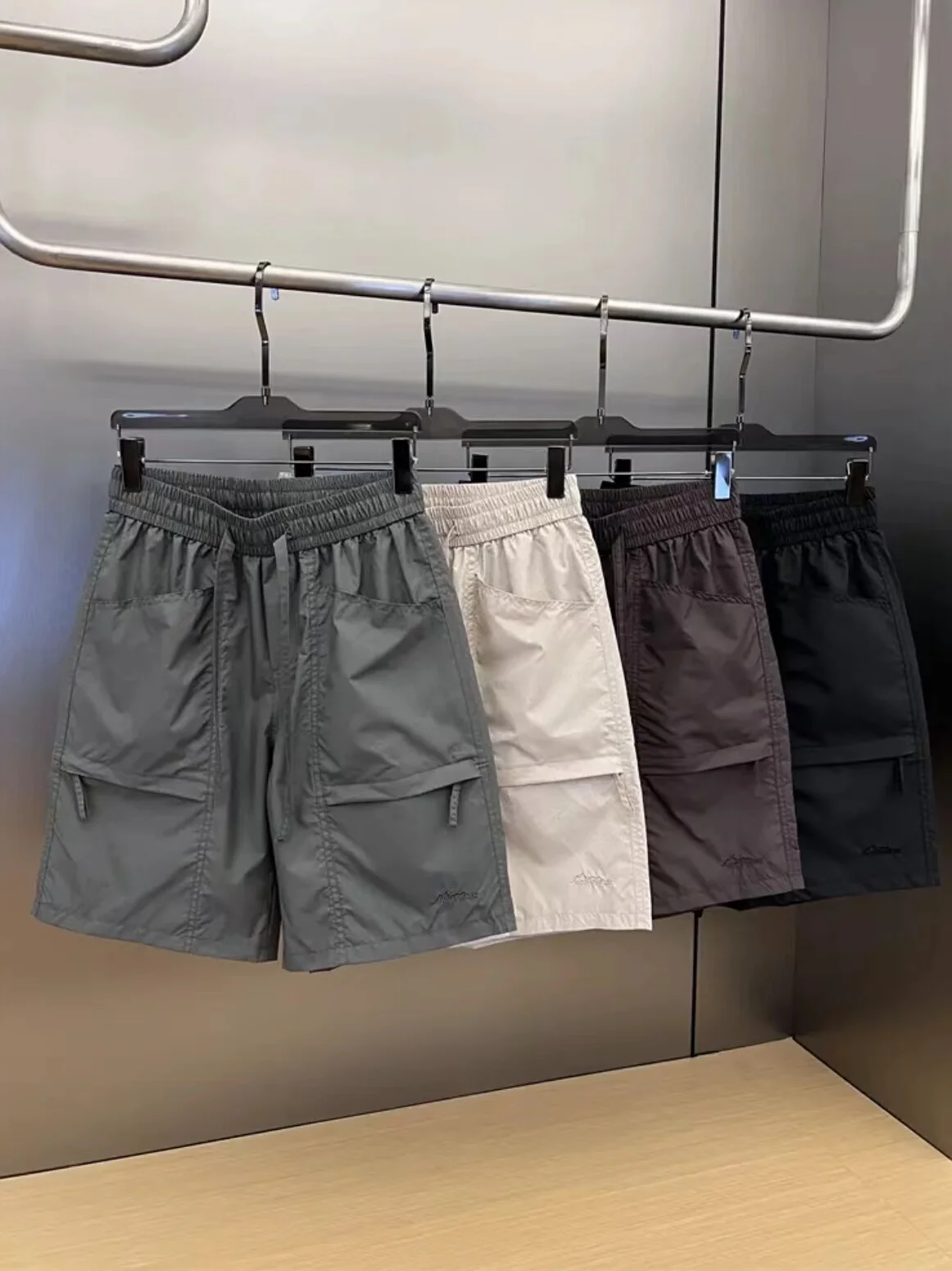 

Summer Thin Laser Perforated Breathable Casual orts Men's Large ket Loose Versatile Qui Dry Sport Five-Quarter Pants