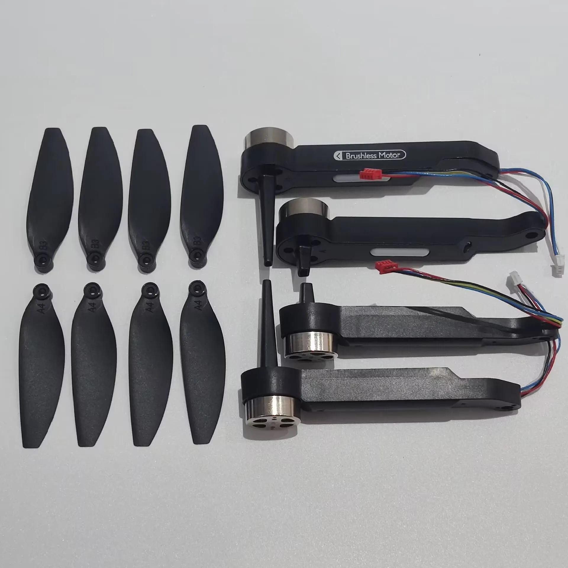 

LSRC XT204 Folding Drone RC Quadcopter Spare Parts Brushless Motor Arm Blade Propeller Wing Maple Leaf Fan Leaf Arm Blades Kit