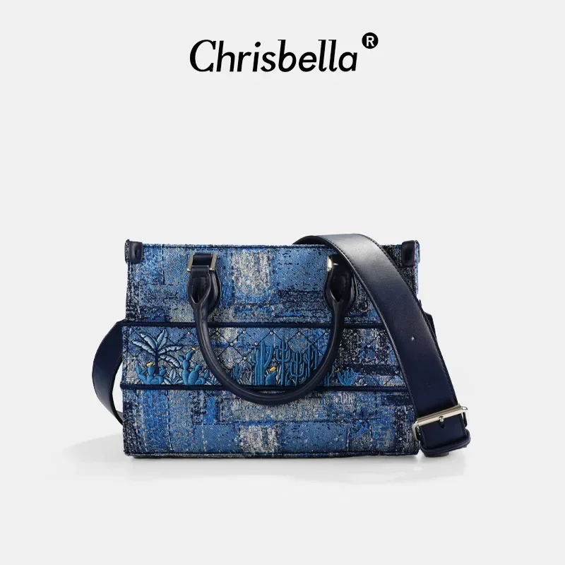 

Chrisbella Heavy Industries' new dark blue tote bag