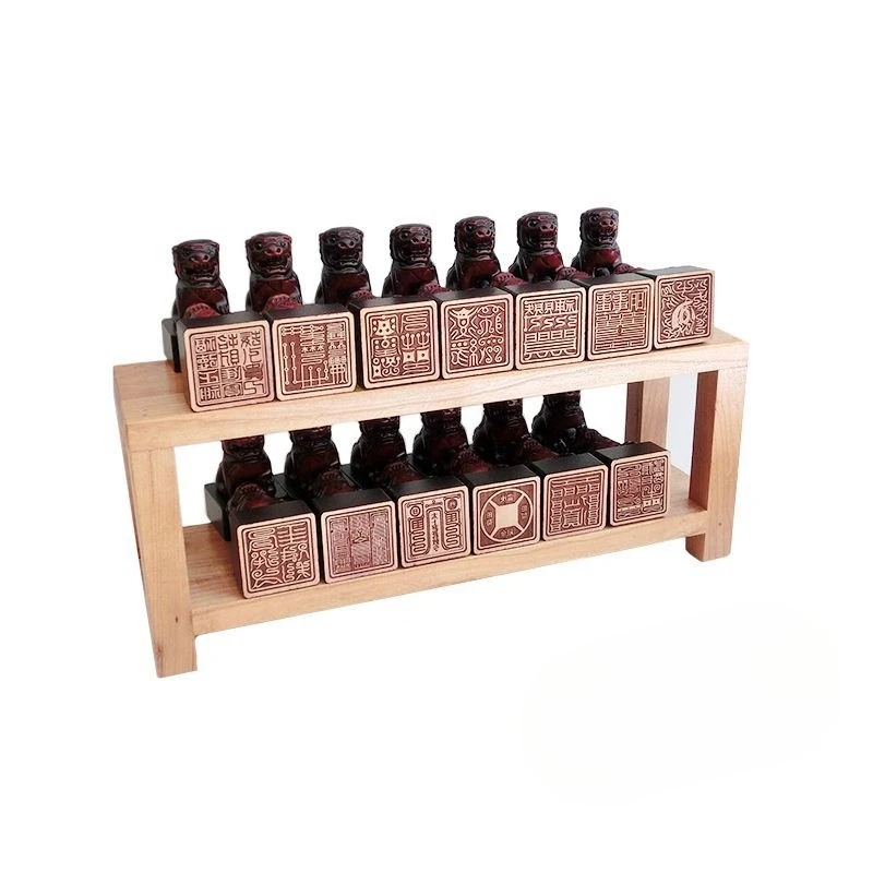 

Monks often use a full set of 26 classic Yunlan Lion Button mahogany seals