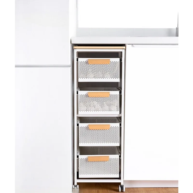 

The cabinet has built-in drawers to pull baskets, and the floor rack for storing fruits and vegetables