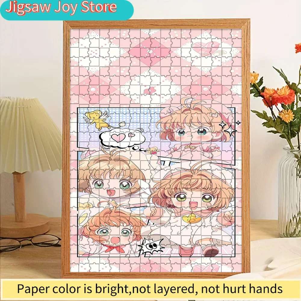 

Cardcaptor Sakura Chibi Paper Puzzle, Adorable Comic-Style Character Art of Sakura Kinomoto with Kero-chan on a Pink Checkered B