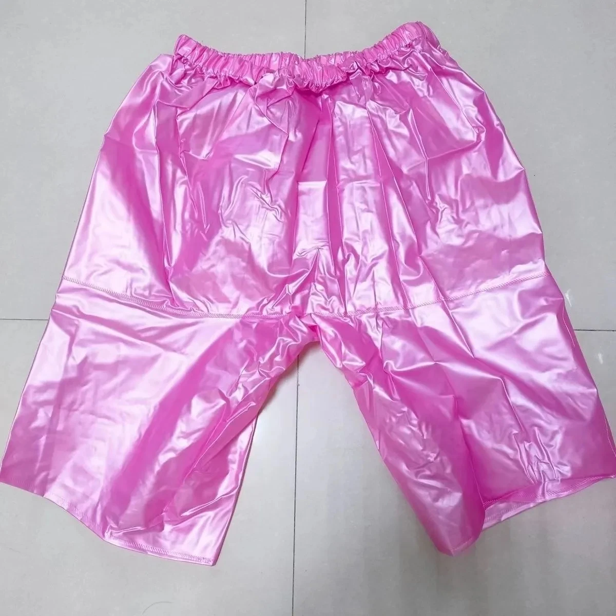 Pantaloncini antipioggia in vita elasticizzati impermeabili in PVC (il colore sottile varia varia)