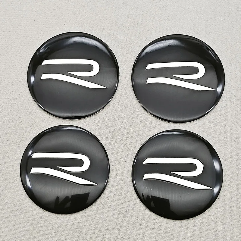 4 قطعة غطاء مركز عجلة السيارة محور قبعات شعار R شارة ملصق ل Volkswagen VW جولف ساجيتار باسات بيتل توران أطلس T-Roc