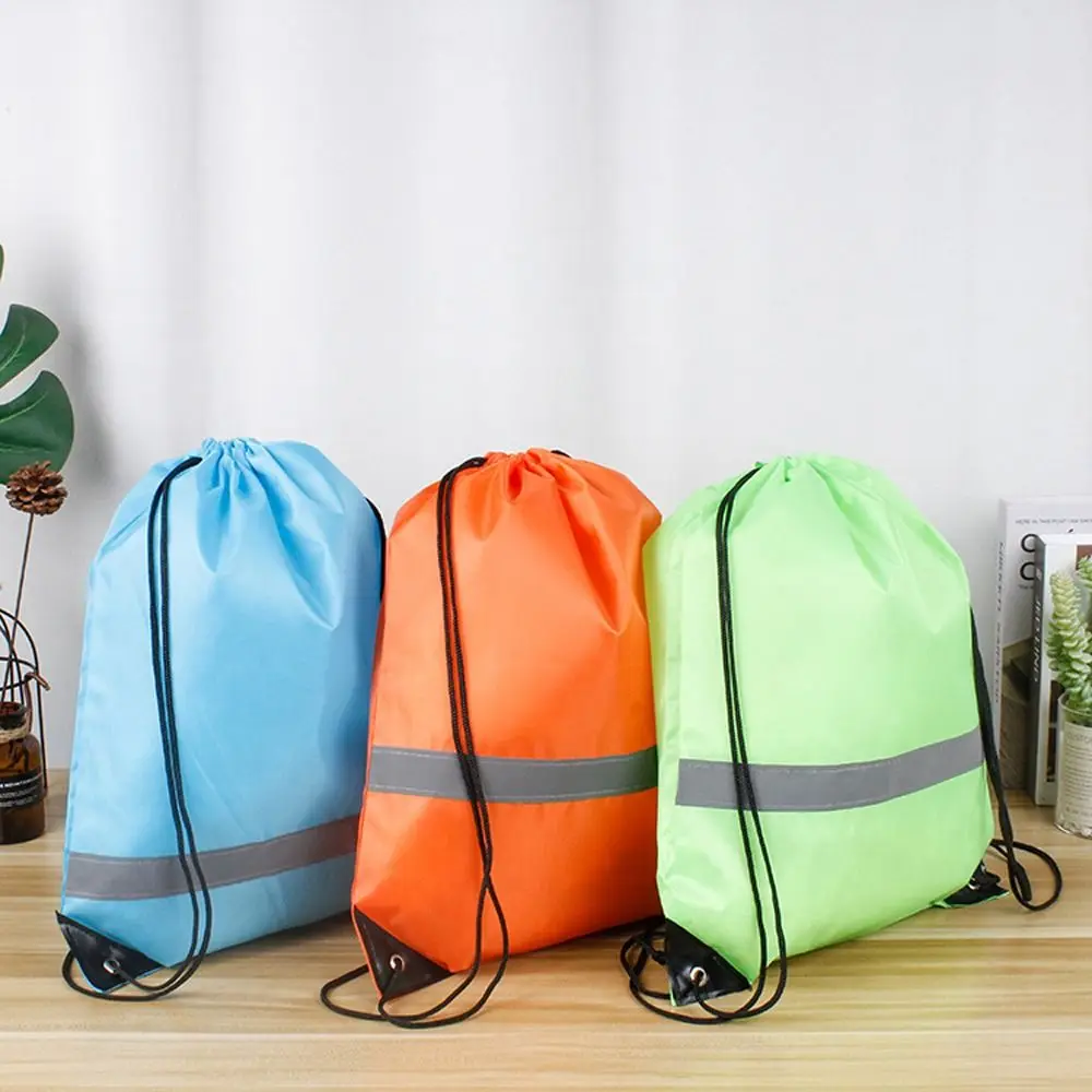 

Reflective Stripe Drawstring Gym Backpack 210D Polyester Solid Color Nylon Sports Shoulder Bag Portable Foldable Fitness Handbag