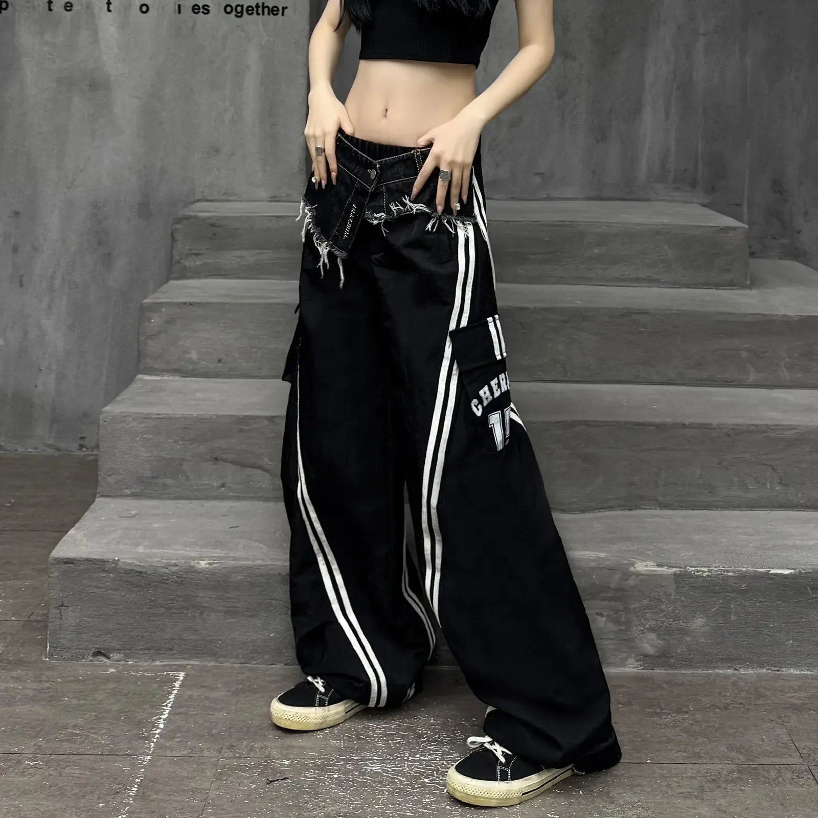 الهيب هوب الربط بنطال ذو قصة أرجل واسعة للنساء في ربيع 2025 جديد شارع العليا التخسيس فضفاض السراويل الكلمة غير رسمية الملابس النسائية