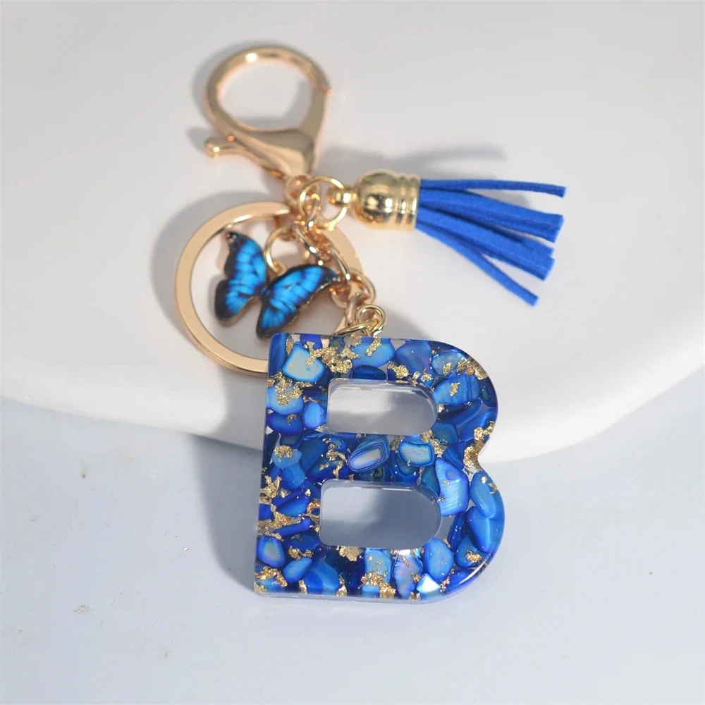 Modischer blauer glasierter Stein, A bis Z, Buchstaben-Schlüsselanhänger, 26 Initialen, Alphabet, Schmetterling, Quaste, Anhänger, Auto-Schlüsselanhänger, Damenschmuck, Geschenke