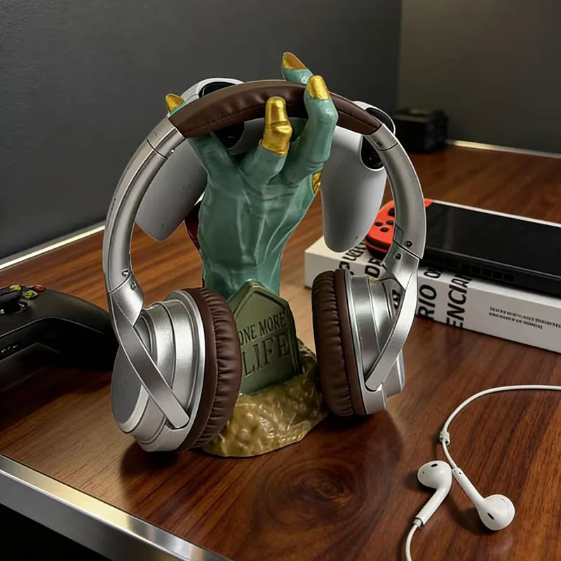 Creative skull hand gamepad, earphone holder, computer desktop storage decorative ornament