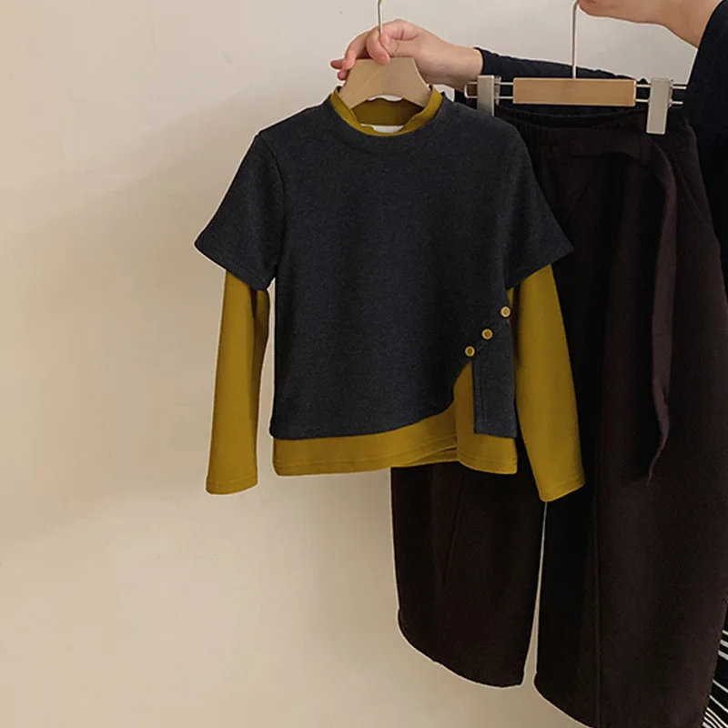Girls' autumn and winter new style diagonal buckle contrasting color round neck fake two-piece top velvet curved knife pants