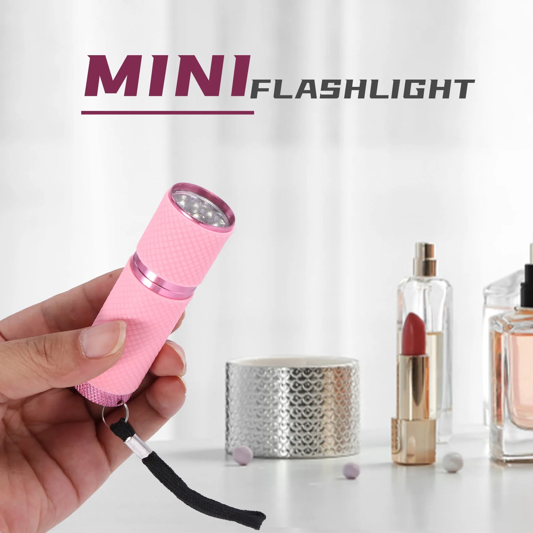 Mini linterna de 9 LED recubierta de goma rosa para exteriores
