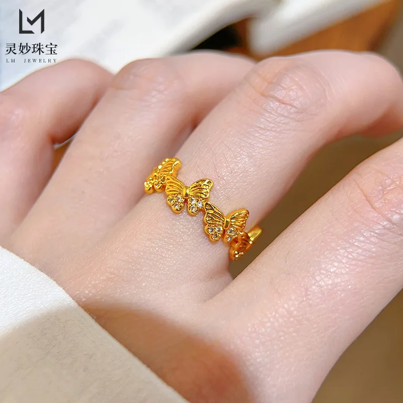 The same 24K real gold dot diamond small crooked butterfly ring in the gold shop 9999 princess style butterfly ring closed tone